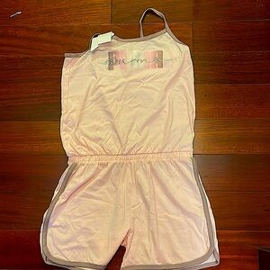 Puma one piece that’s stretchy. Stylish price is a large in girls